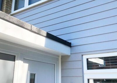 Newly-installed white wall cladding